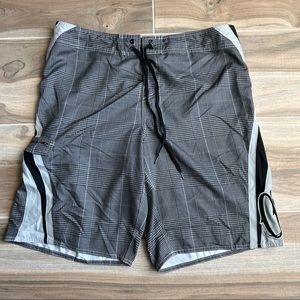 Mens O’Neill swim trunks.